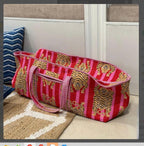 	Tiger print quilted carry bag with rolled yoga mat, long tote for yoga or mahjong nights