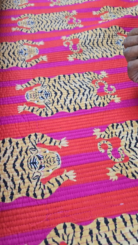 Close-up of tiger stripe quilted fabric on the longline yoga and mahjong carry bag