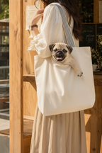 Real Pug puppy peeking out of a canvas tote bag at a cafe – adorable lifestyle photo for pug mom gift